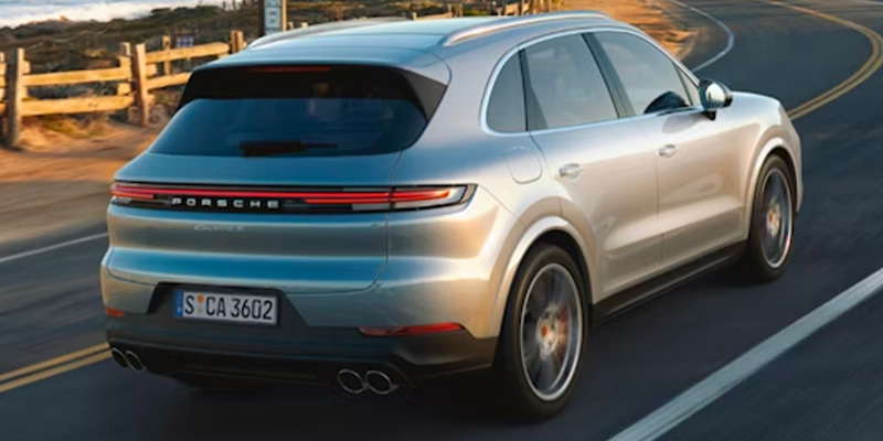 2026 Porsche Cayenne in it's back profile cruising on Highway